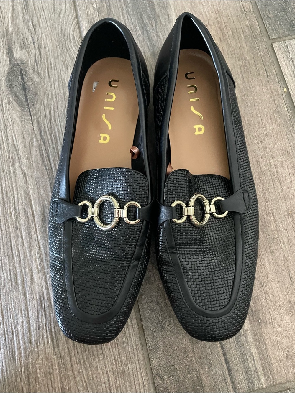 Unisa Black Textured Loafers with Gold-Link Accent